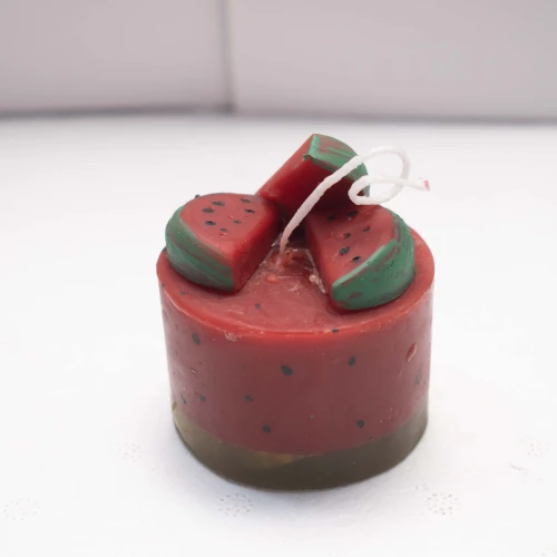 Vela con forma de fruta